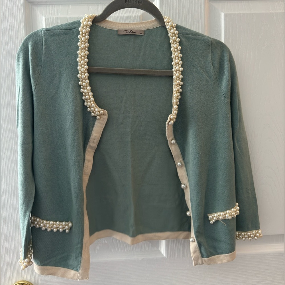 Faux pearl button sweater